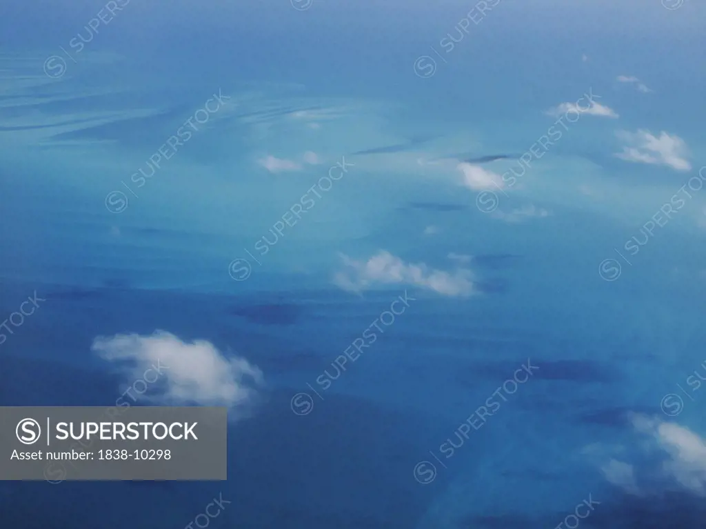 White Clouds Above Turquoise Water, High Angle View