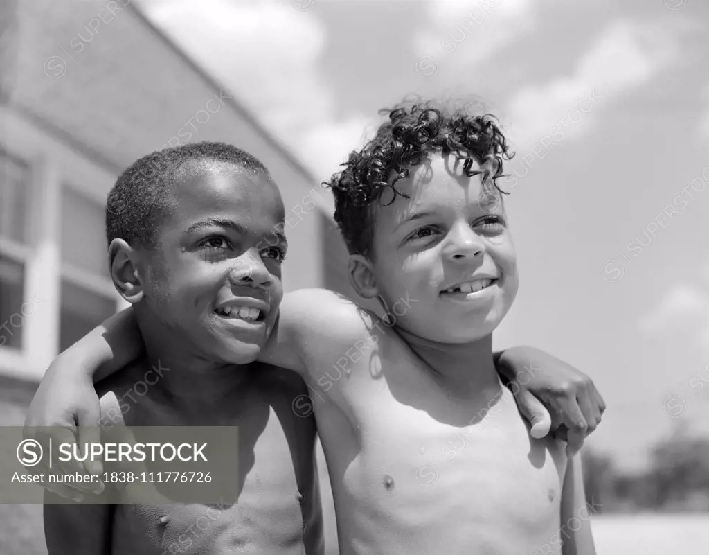 Two Young Boys with Arms over each other's Shoulders, Frederick Douglass Housing Project, Anacostia Neighborhood, Washington DC, USA, Photograph by Gordon Parks, June 1942