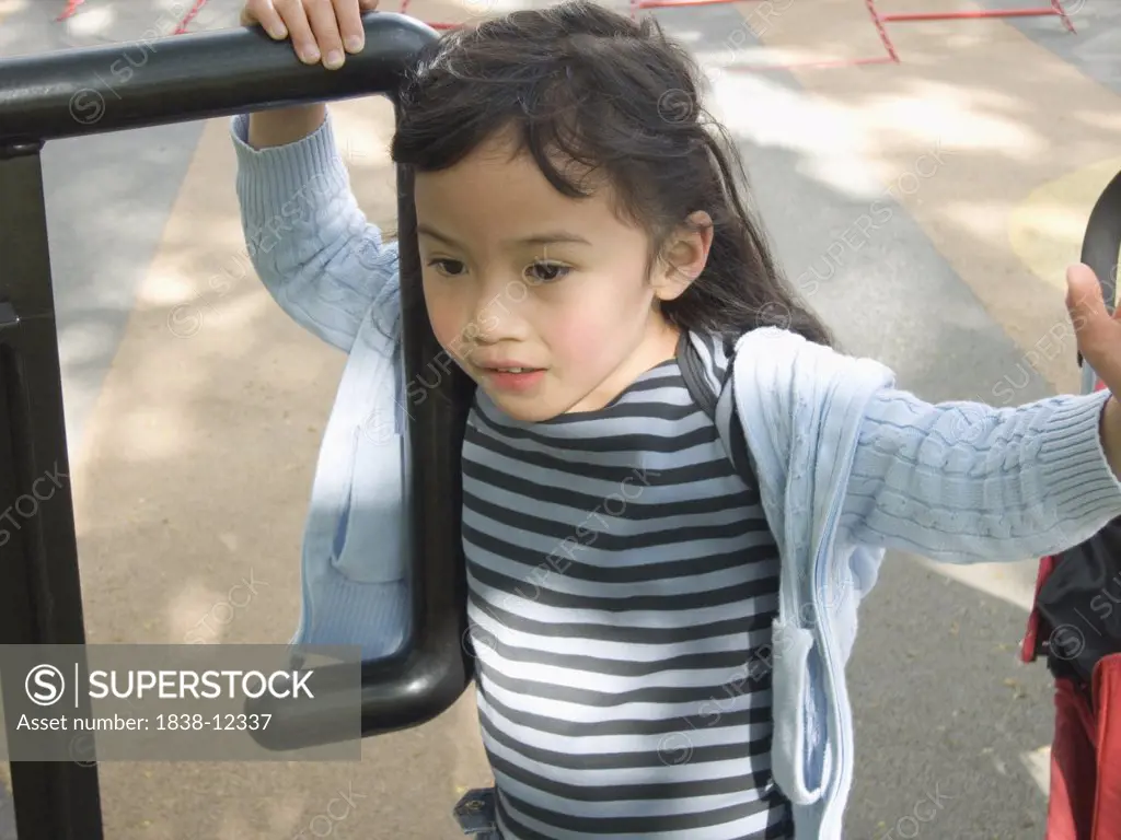 Child Playing in Playground