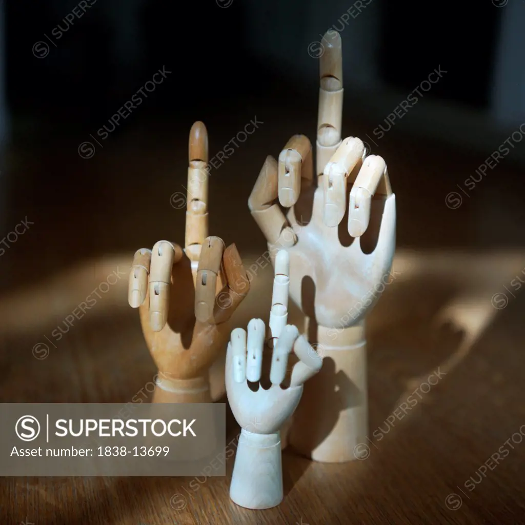 Wooden Hands With Middle Fingers Up