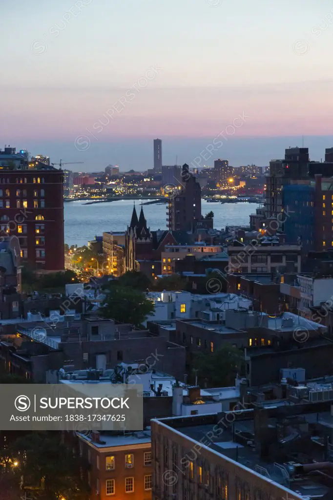 Cityscape at Dusk, Hudson River in Background, West Village, New York City, New York, USA