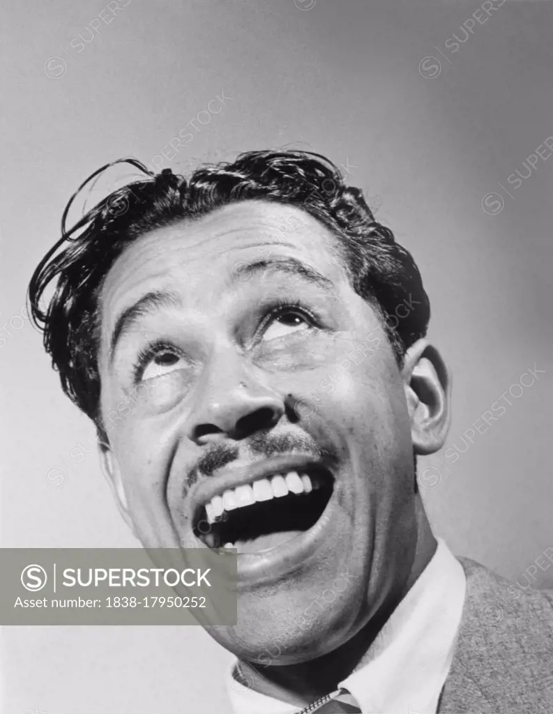 Cab Calloway (1907-1994), American Jazz Singer, Dancer, and Bandleader, Head and Shoulders Portrait, Columbia Studio, New York City, New York, USA, William P. Gottlieb, March 1947