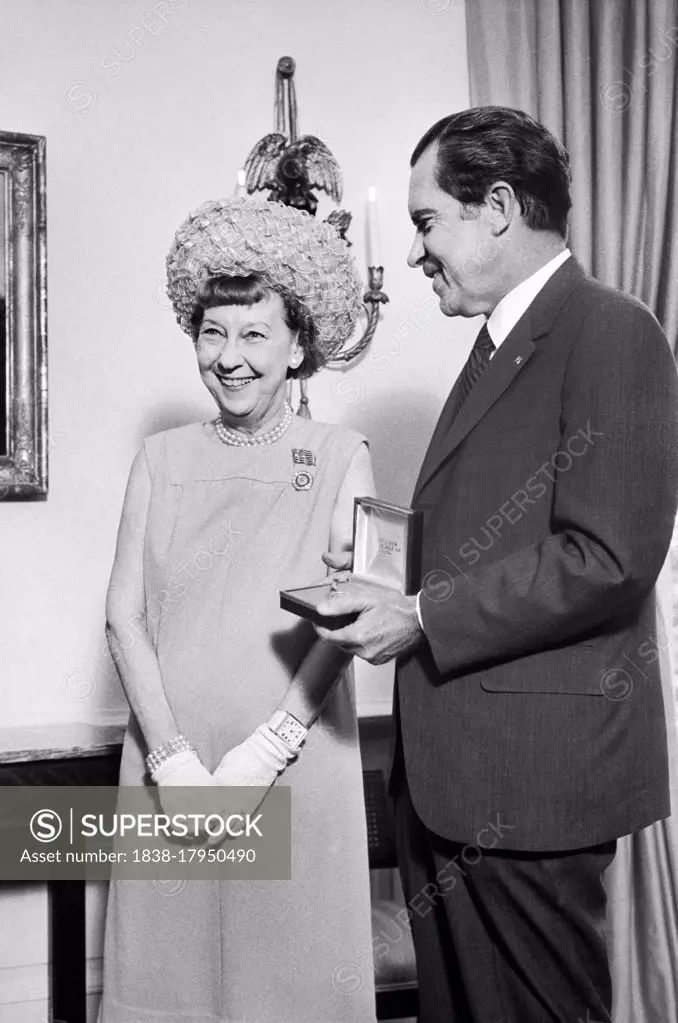 U.S. President Richard Nixon with former First Lady Mamie Eisenhower during Eisenhower Dollar Presentation, White House, Washington, D.C., USA, Marion S. Trikosko, July 27, 1971