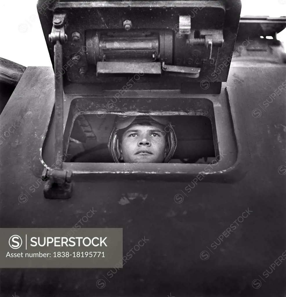 Sergeant George Camblair learning to drive a Tank, Fort Belvoir, Virginia, USA, Jack Delano, U.S. Office of War Information, September 1942