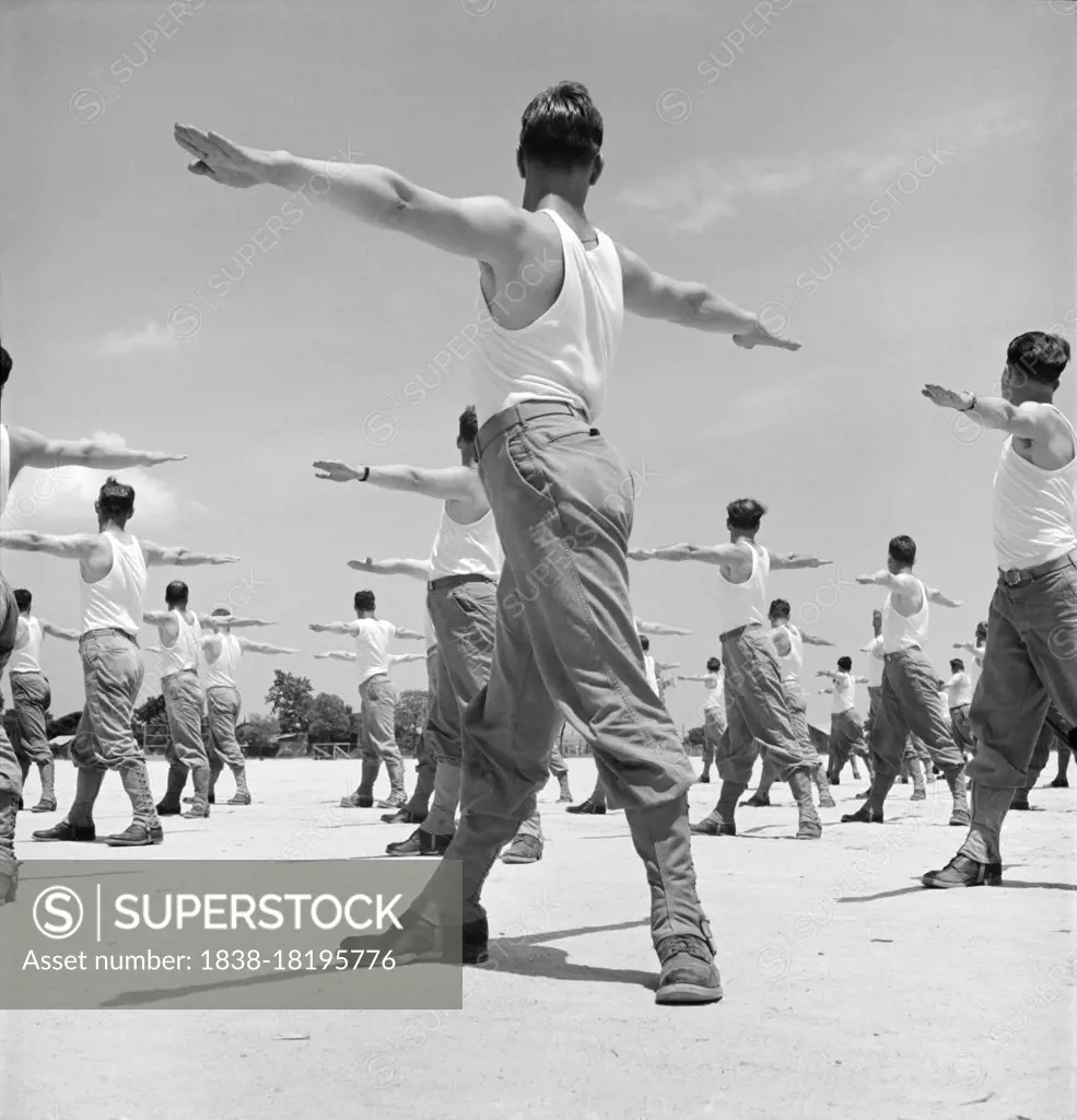 Enlisted Men going through Calisthenics Routine, Air Service Command, Daniel Field, Georgia, USA, Jack Delano, U.S. Office of War Information, July 1943