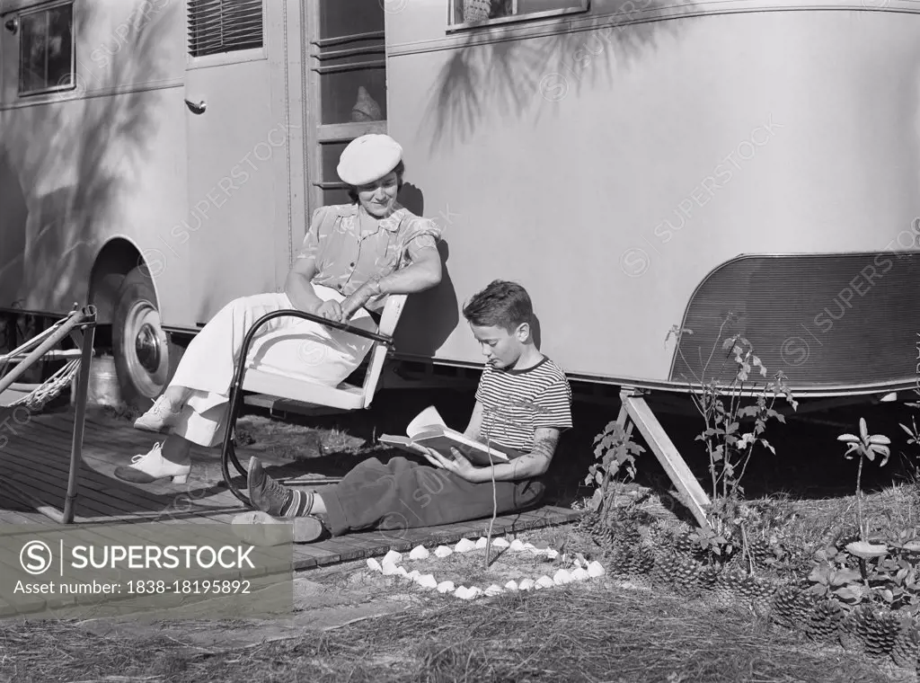 Mother listening to son read. Sarasota trailer park, Sarasota, Florida, USA, Marion Post Wolcott, U.S. Farm Security Administration, January, 1941