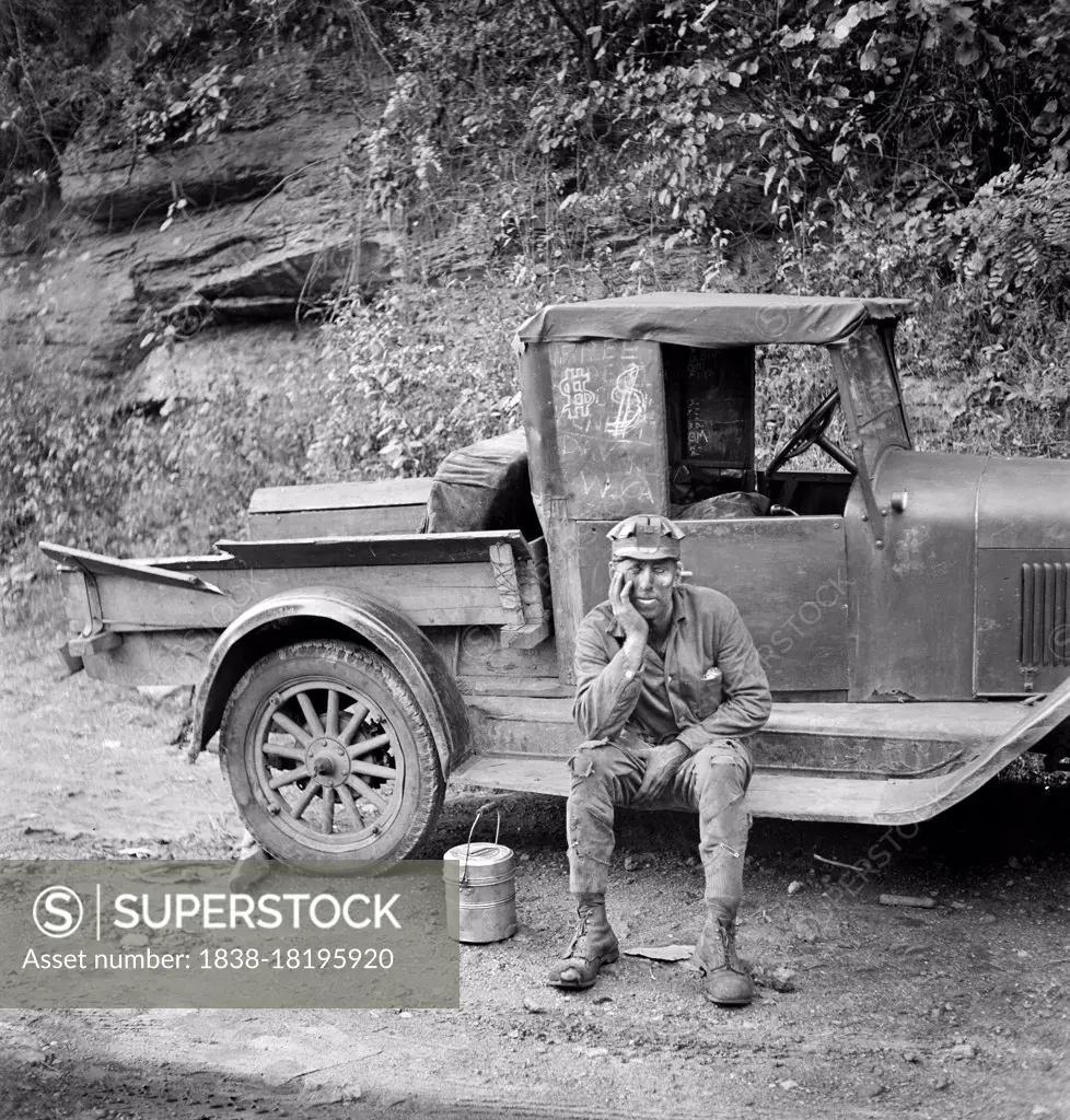 Miner waiting for ride home, Capels, West Virginia, USA, Marion Post Wolcott, U.S. Farm Security Administration, September 1938