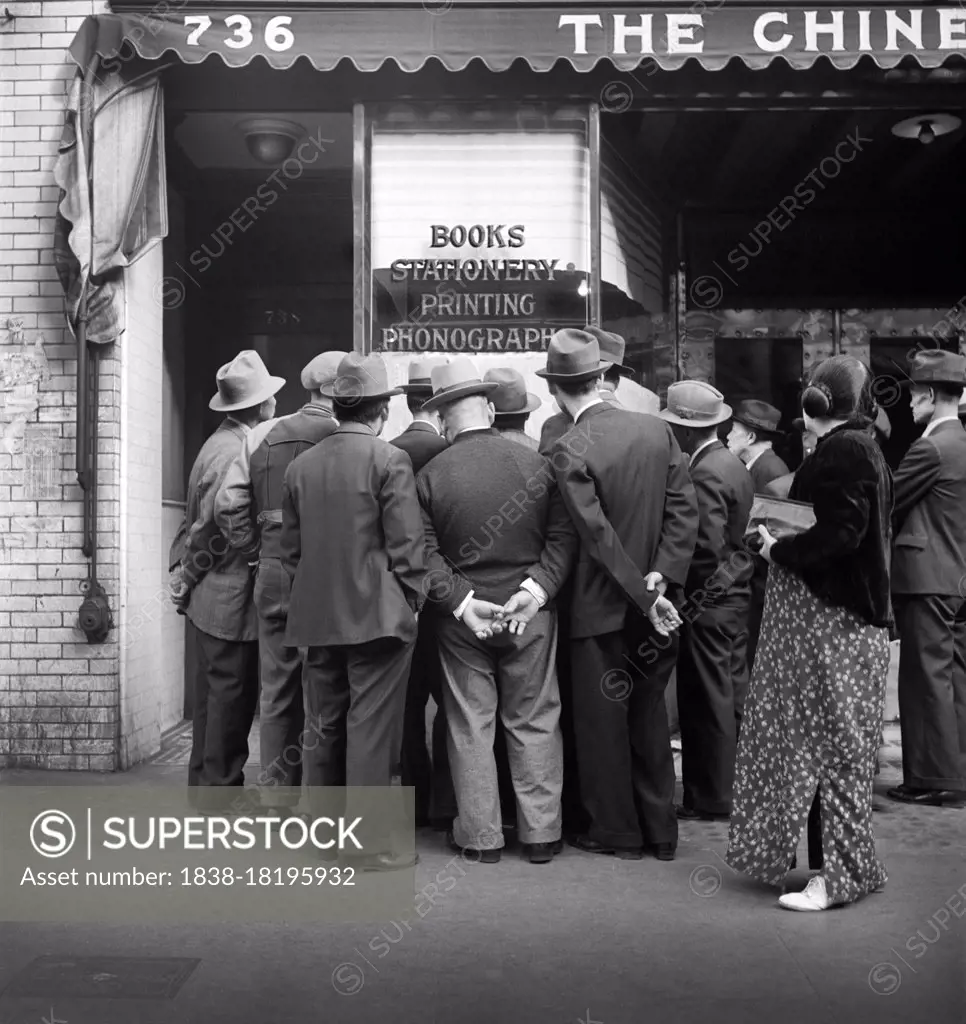 Group of Chinese Men reading News of the Surrender of Canton to the Japanese, Chinatown, San Francisco, California, USA, Dorothea Lange, U.S. Office of War Information, November 1938