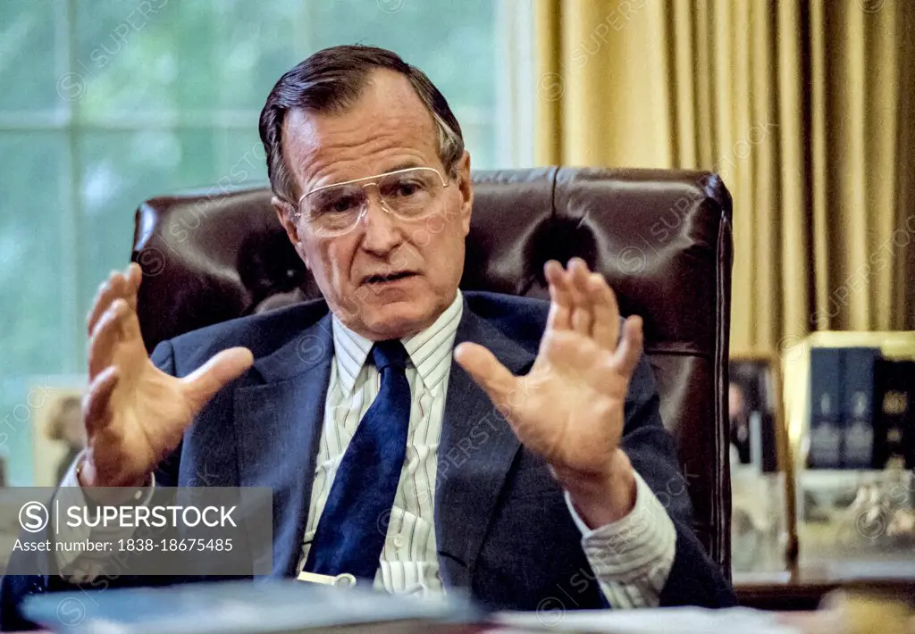 U.S. President George H.W. Bush at his Oval Office desk, White House, Washington, D.C., USA, Michael Geissinger, 1989