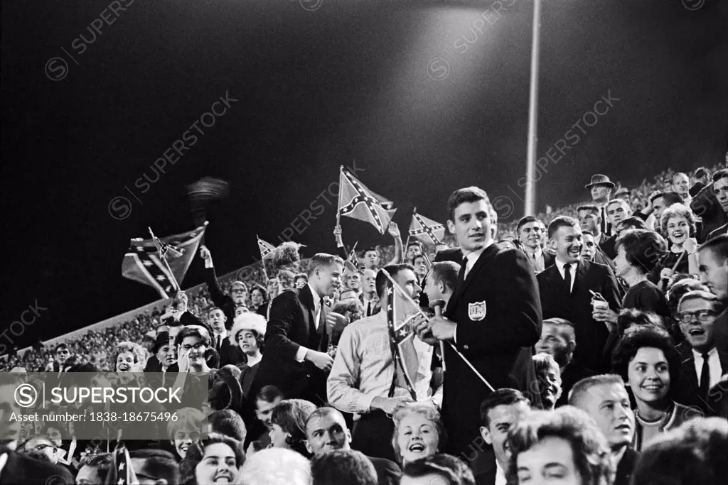 Crowd with Confederate Flags at University of Mississippi Football Game protesting James Meredith, first African-American Student to enroll at the school, Oxford, Mississippi, USA, Marion S. Trikosko, U.S. News & World Report Magazine Photograph Collection, September 29, 1962