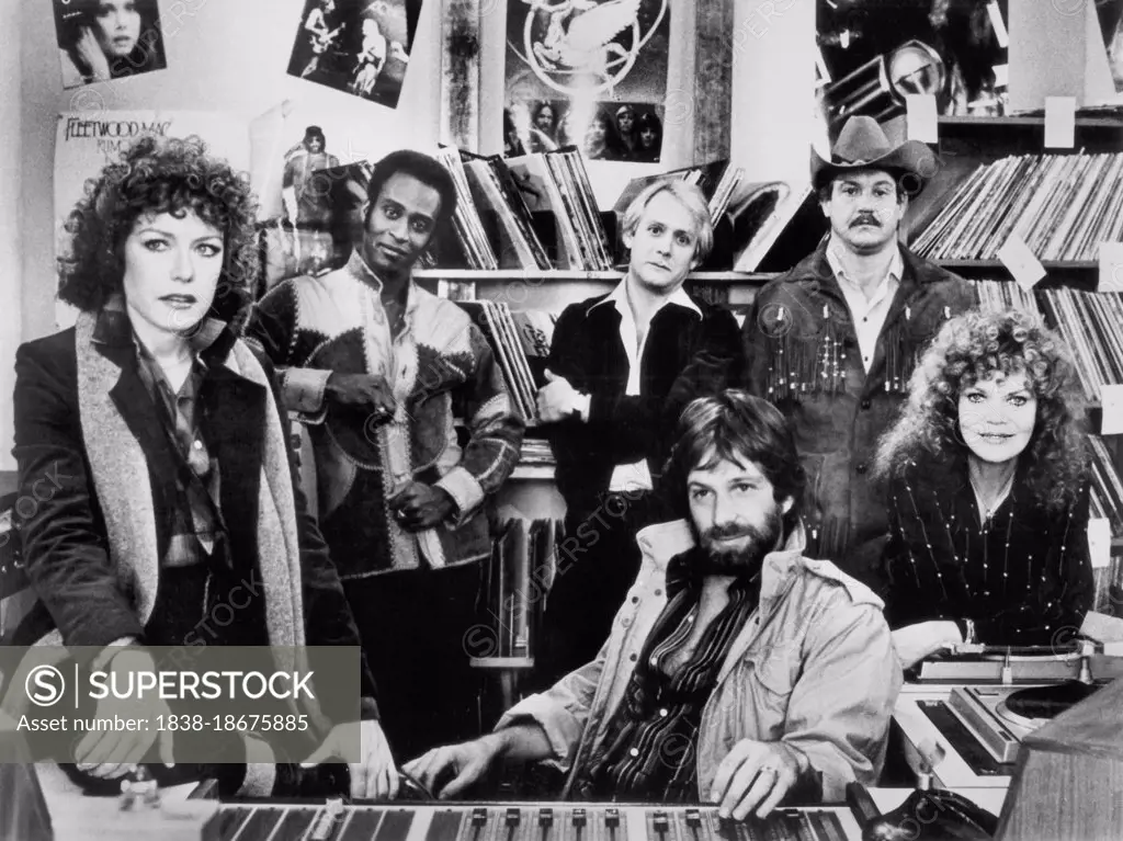 (l-r) Cassie Yates, Cleavon Little, Martin Mull, Alex Karras, Eileen Brennan, Michael Brandon (seated), on-set of Film, "FM", Universal Pictures, 1978