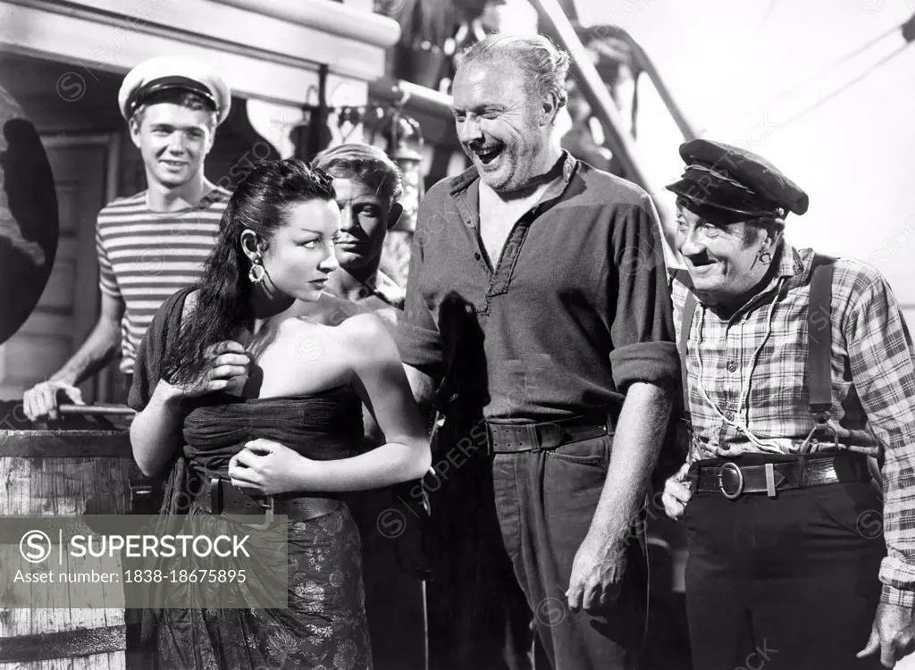 (l-r) Claude Jarman Jr., Vera Ralston, Howard Petrie, Paul Fix, on-set of the Film, "Fair Wind to Java", Republic Pictures, 1953