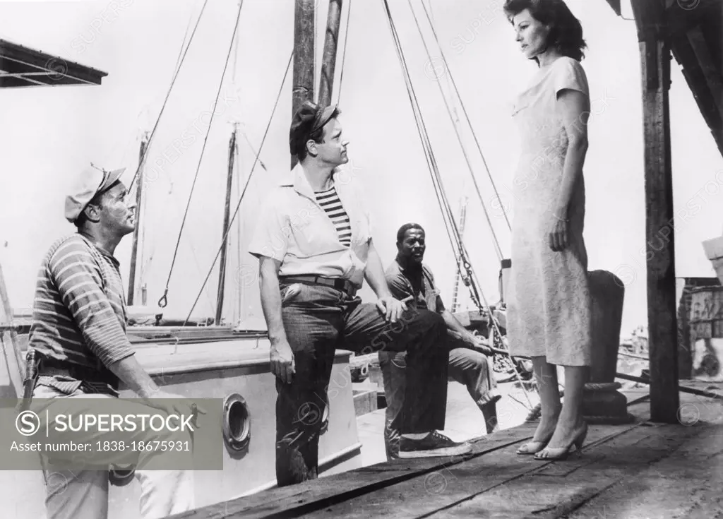 Robert Mitchum, Jack Lemmon, Rita Hayworth, on-set of the Film, "Fire Down Below", Columbia Pictures, 1957