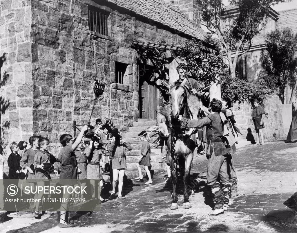 Burt Lancaster (center), on-set of the Film, "The Flame and the Arrow", Warner Bros., 1950