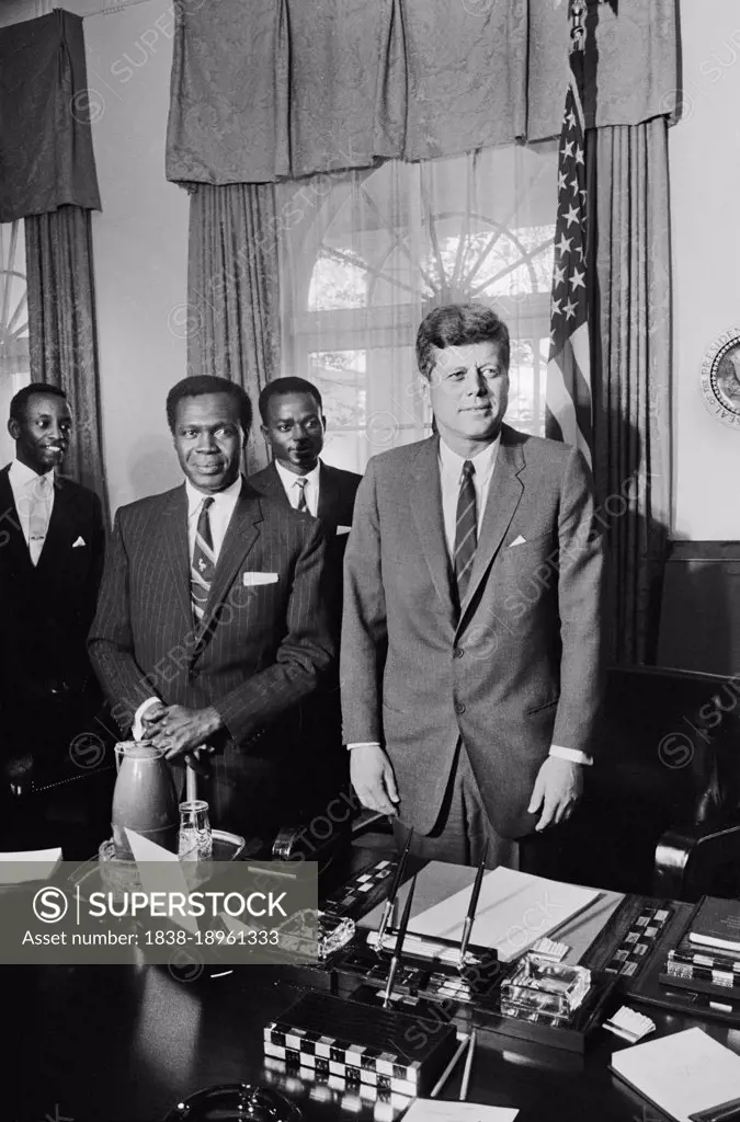 Grace Ibingira, Ugandan Prime Minister Milton Obote, John Kakonge with U.S. President John Kennedy in Oval Office, White House, Washington, DC, USA, Warren K. Leffler, US News & World Report Magazine Collection, October 22, 1962