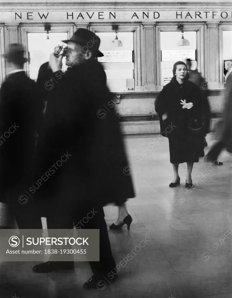 People in front of ticket windows for New York, New Haven, and Hartford Railroad, Main concourse, Grand Central Terminal, New York City, New York, USA, Angelo Rizzuto, Anthony Angel Collection, December 1957 