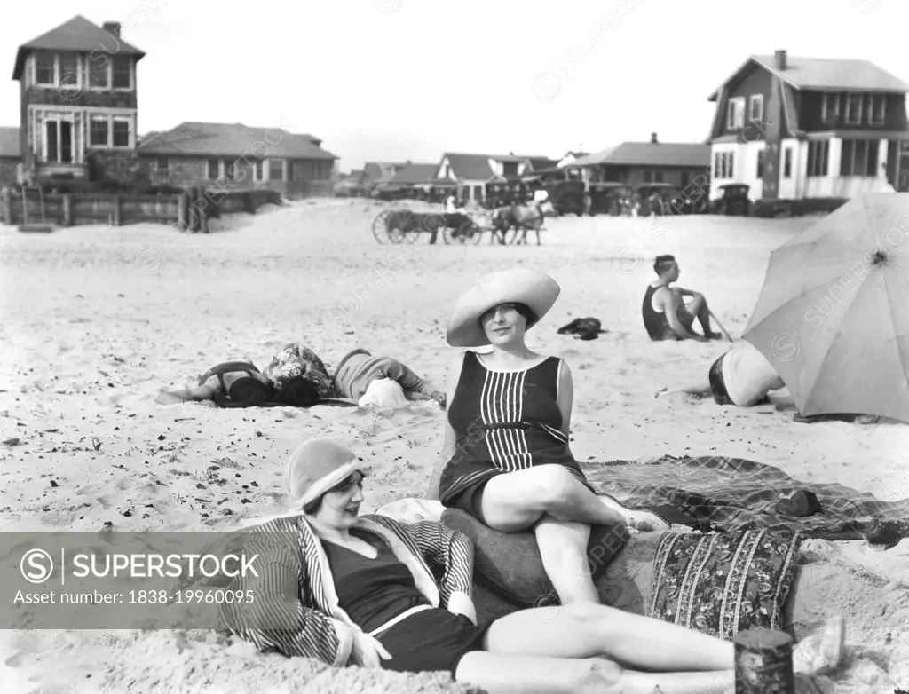 Two Women relaxing on Beach, Long Beach, New York, USA, Arnold Genthe, 1910's