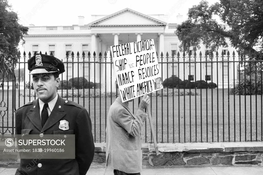 Man protesting for  John Kasper, an American far-right activist and Ku Klux Klan member who took a militant stand against racial integration during the civil rights movement, Washington, D.C., USA, Thomas J. O'Halloran, U.S. News & World Report Magazine Photograph Collection , October 1957