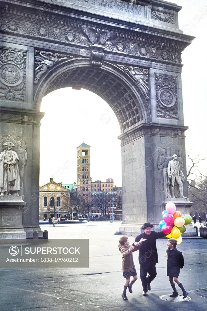 Man and Two Boys with bunch of Balloons, Washington Square, Greenwich Village, New York City, New York, USA, Toni Frissell Collection, September 1966