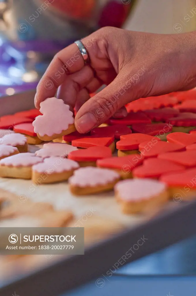 Hand Holding Heart-Shaped Cookie