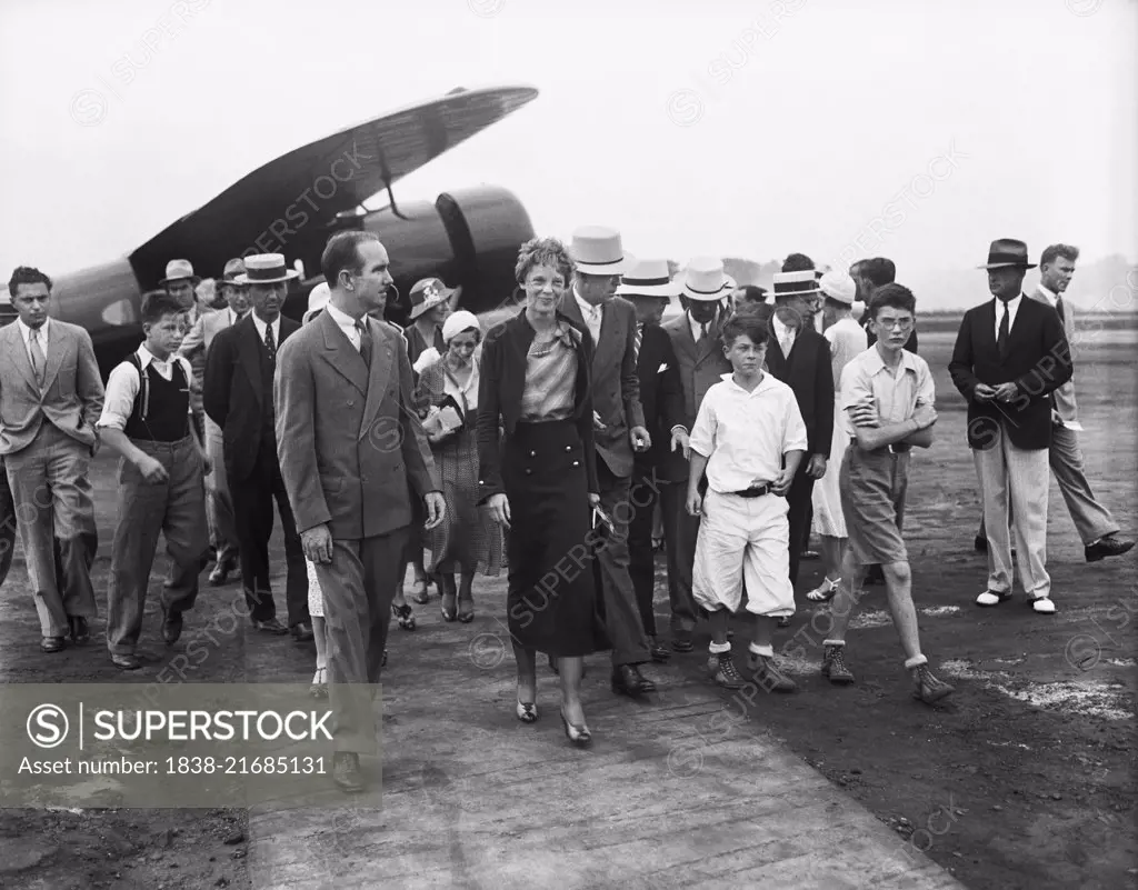 Amelia Earhart with Group of People near Airplane, Harris & Ewing, 1932