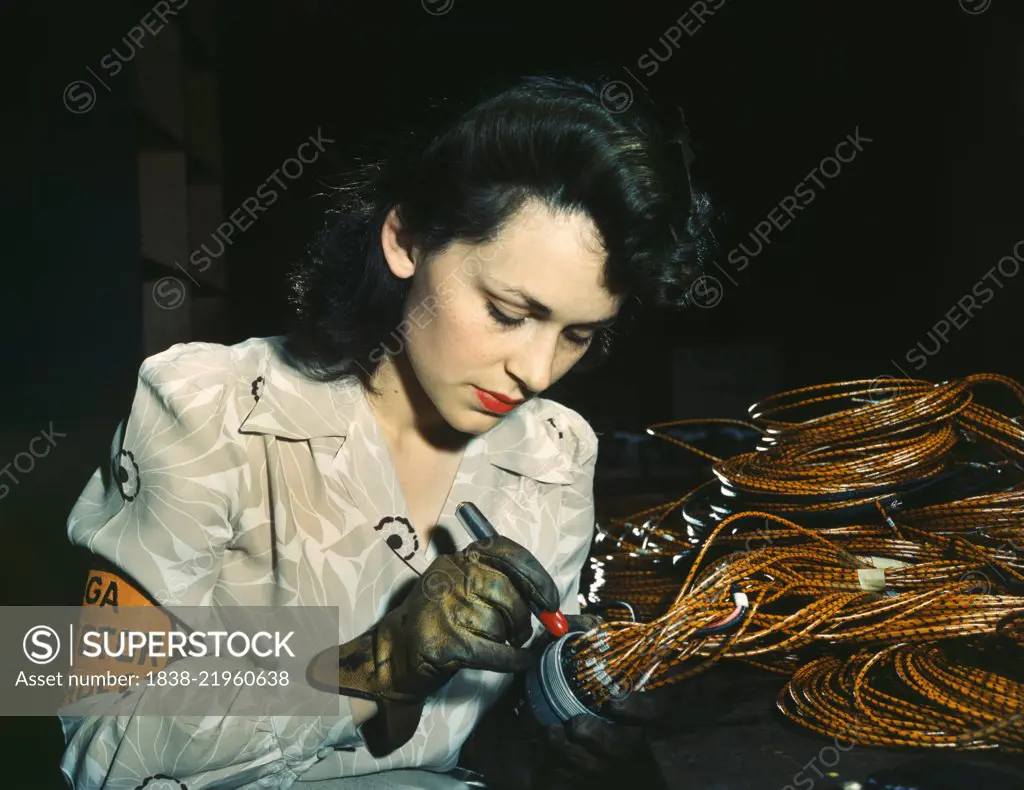 Female Aircraft Worker Checking Electrical Assemblies, Vega Aircraft Corporation, Burbank, California, USA, David Bransby for Office of War Information, June 1942