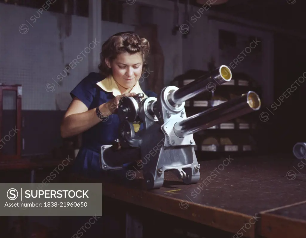 Young Woman Working on Landing Gear Mechanism of P-51 Fighter Plane, North American Aviation, Inc., Inglewood, California, USA, Alfred T. Palmer for Office of War Information, October 1942