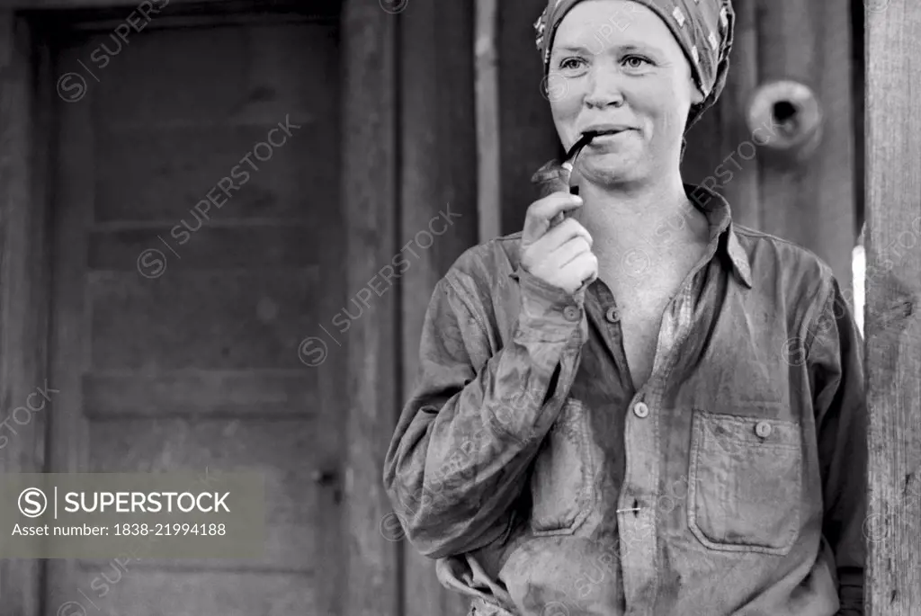 Wife of Ozark Mountains Farmer Smoking Pipe, Missouri, USA, John Vachon for Farm Security Administration, May 1940