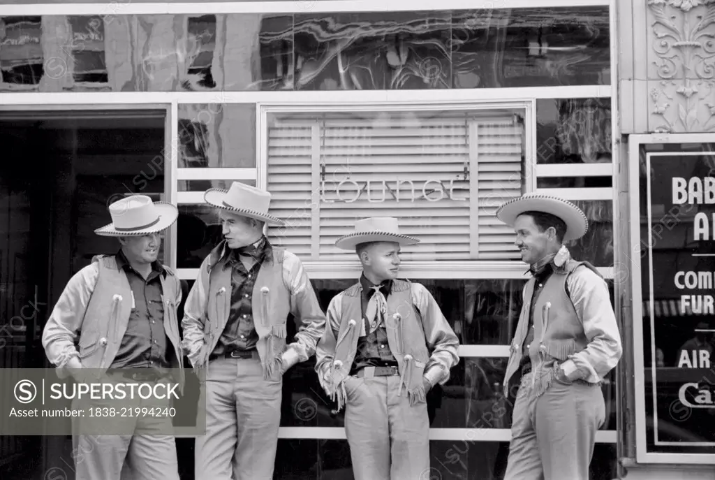 Four Cowboys Dressed Alike in Front of Bar, Billings, Montana, USA, Arthur Rothstein for Farm Security Administration, July 1939