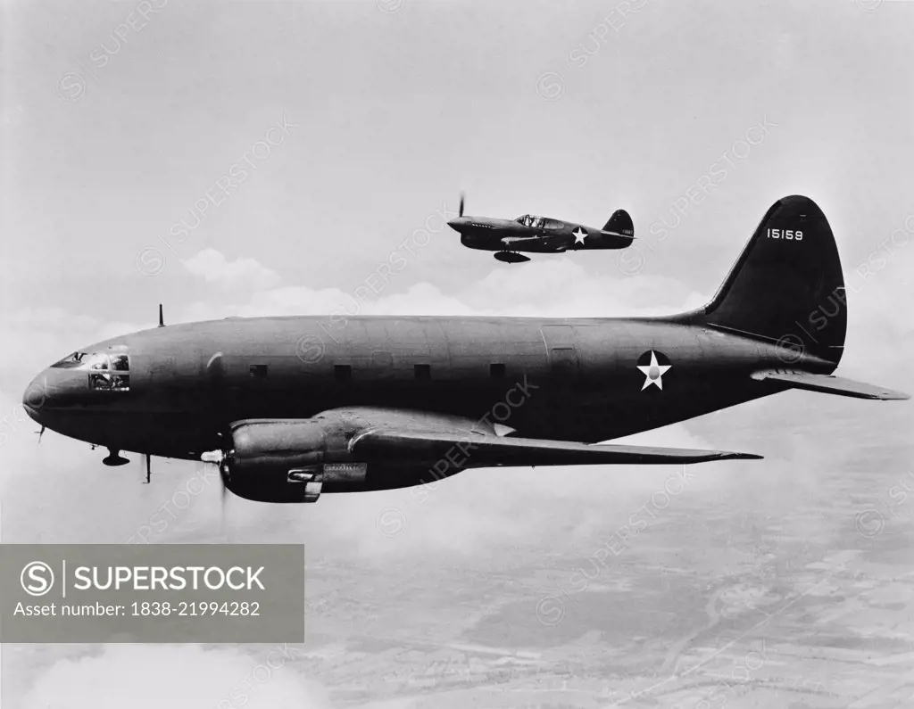 C-46 Transport Plane with P-40 Single-Engine Fighter Plane in Background, Office of War Information, March 1943