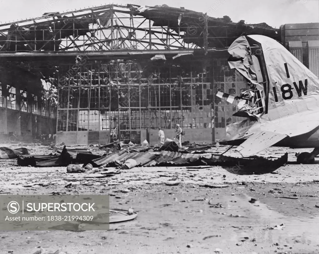 Damaged Hangar No. 11 after Imperial Japanese Navy Air Service Attack, Hickam Field, Pearl Harbor Hawaii, Office of Emergency Management, December 7, 1941