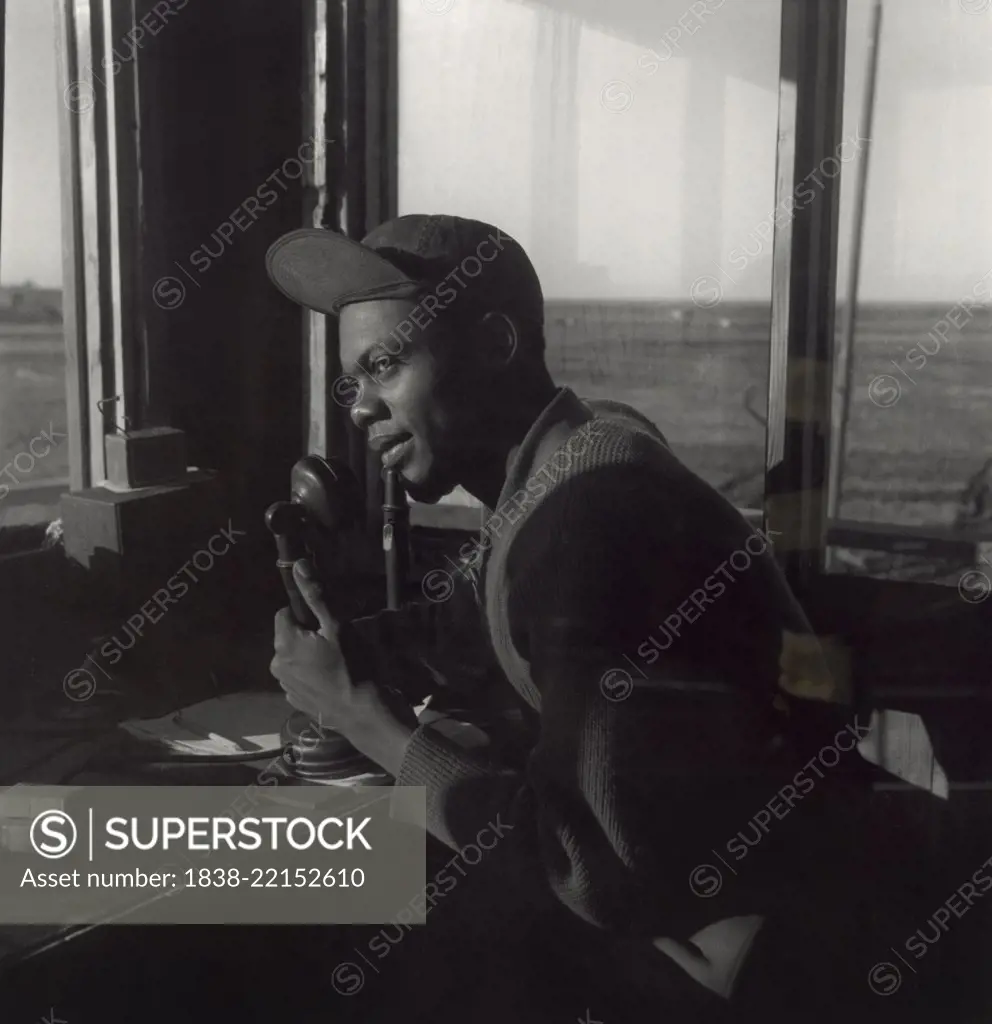 Sgt. William P. Bostic, 301st F.S. in Air Base Control Tower, Ramitelli, Italy, Toni Frissell, March 1945