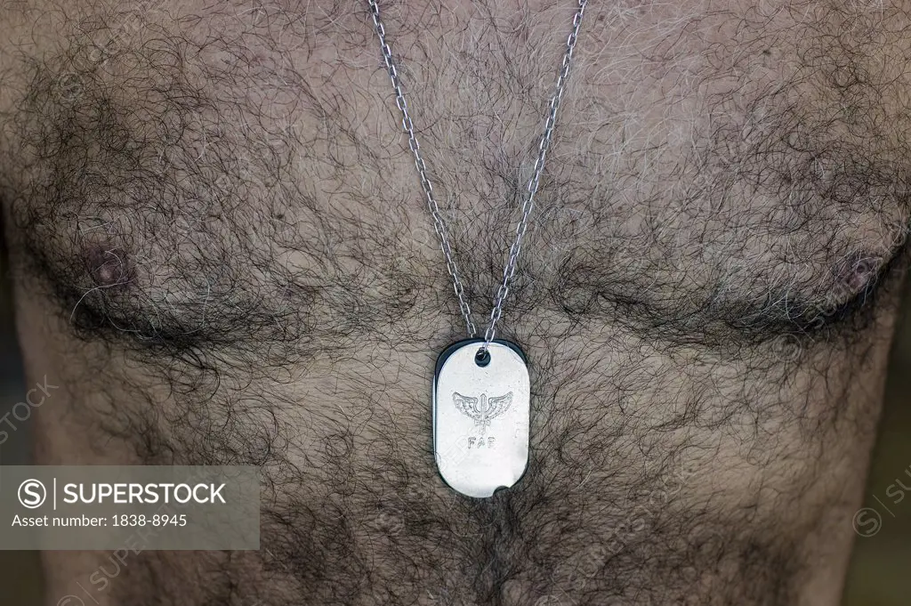 Man Wearing Military Dogtag