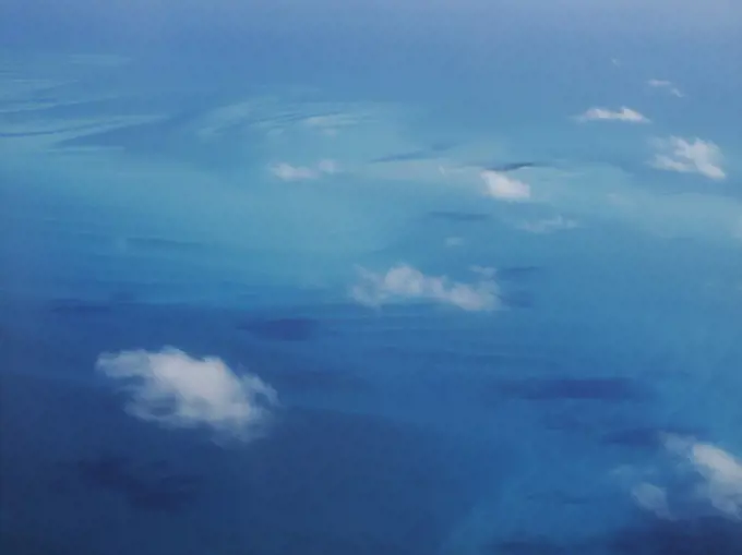 White Clouds Above Turquoise Water, High Angle View