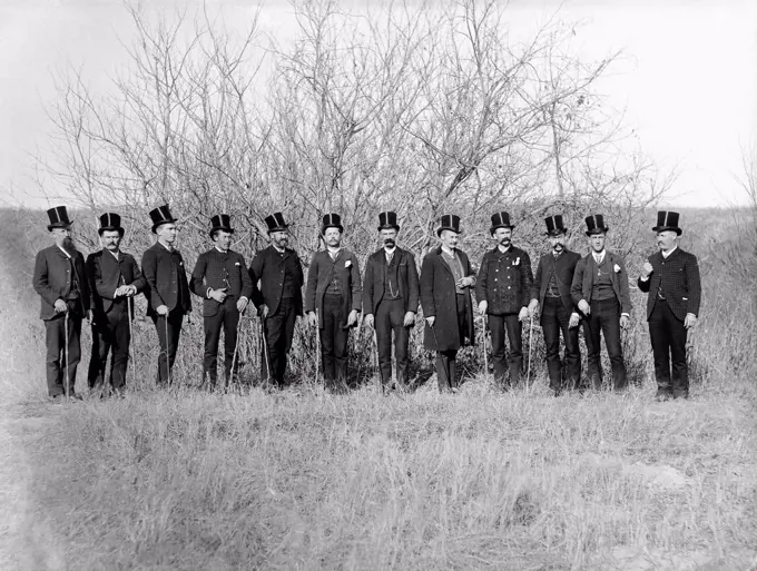 Group of  Democrats in Black Silk Plug Hats during Grover Cleveland Presidential Campaign, Full-Length Portrait, Mason City, Nebraska  USA, Photograph by Solomon D. Butcher, 1888