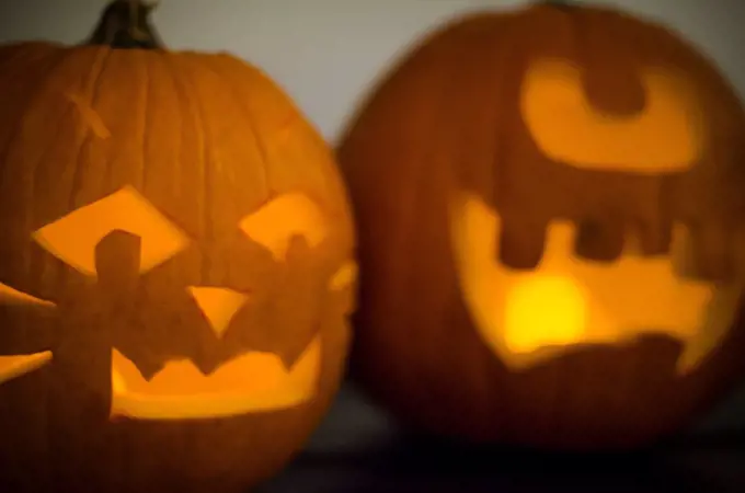 Two Carved Pumpkin Halloween Jack-O-Lanterns