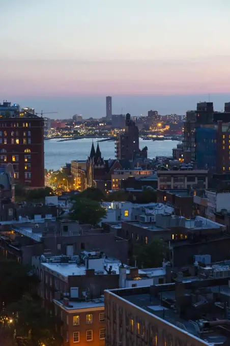 Cityscape at Dusk, Hudson River in Background, West Village, New York City, New York, USA