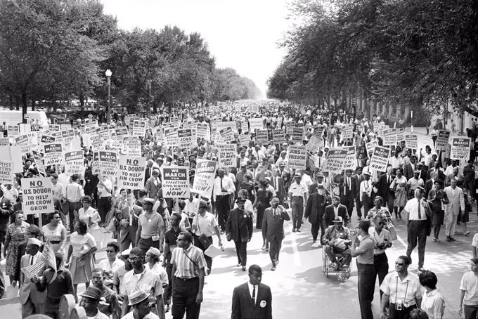 Crowd with Signs at March on Washington for Jobs and Freedom, Washington Monument in Background, Washington, D.C., USA, photo by Warren K. Leffler, August 28, 1963