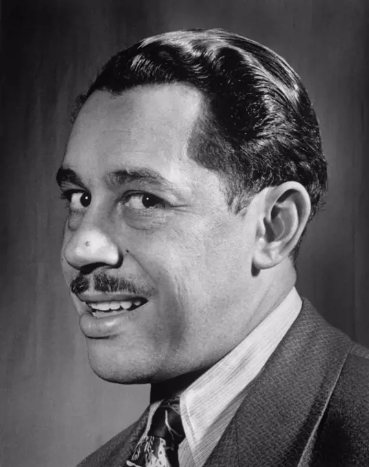 Cab Calloway (1907-1994), American Jazz Singer, Dancer, and Bandleader, Head and Shoulders Portrait, Columbia Studio, New York City, New York, USA, William P. Gottlieb, March 1947