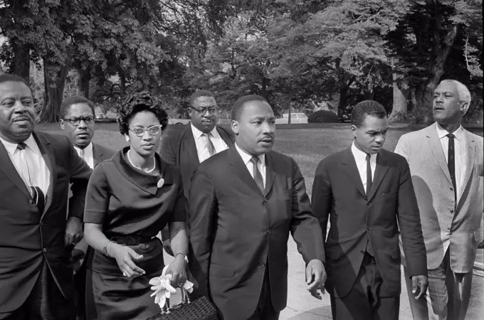 Ralph Abernathy (left), Martin Luther King, Jr. (center), John Lewis (2nd right) with group of people leaving White House after meeting with U.S. President Lyndon Johnson, Washington, D.C., USA, Marion S. Trikosko, August 5, 1965