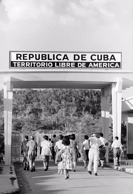 Cuban Workers exiting for the day, Guantanamo Bay U.S. Naval Base, Cuba, Warren K. Leffler, November 12, 1962