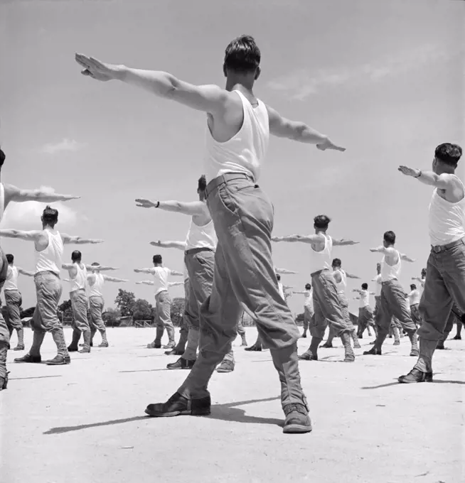 Enlisted Men going through Calisthenics Routine, Air Service Command, Daniel Field, Georgia, USA, Jack Delano, U.S. Office of War Information, July 1943