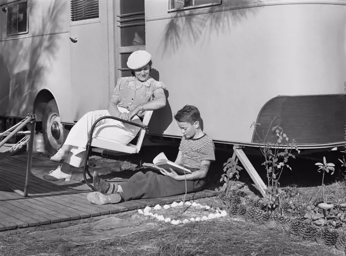 Mother listening to son read. Sarasota trailer park, Sarasota, Florida, USA, Marion Post Wolcott, U.S. Farm Security Administration, January, 1941