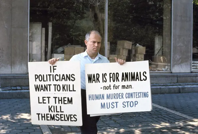 Anti-War Protester with Signs, New York City, New York, USA, Bernard Gotfryd, 1969