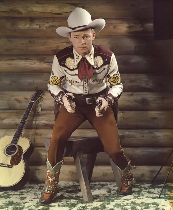 Roy Rogers (1911-1998), American Actor and Singer, full-length Portrait in Cowboy Outfit and Pistols, Harry Warnecke, Robert F. Cranston, 1942