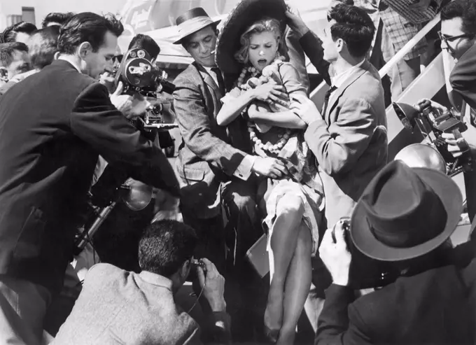 Lee Remick (center), on-set of the Film, "A Face in the Crowd", Warner Bros., 1957