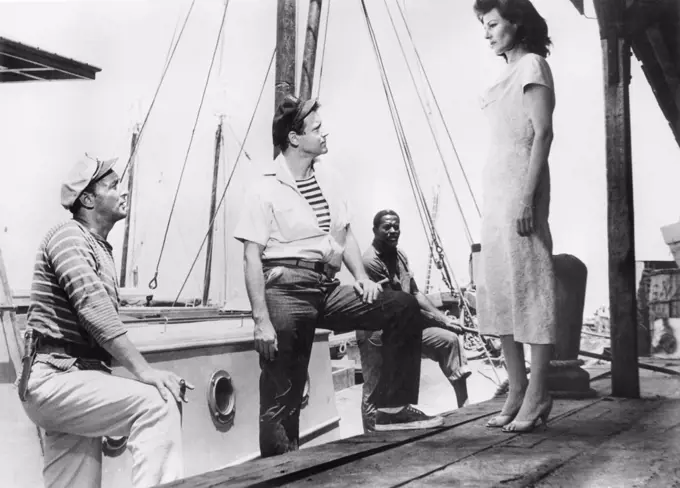 Robert Mitchum, Jack Lemmon, Rita Hayworth, on-set of the Film, "Fire Down Below", Columbia Pictures, 1957