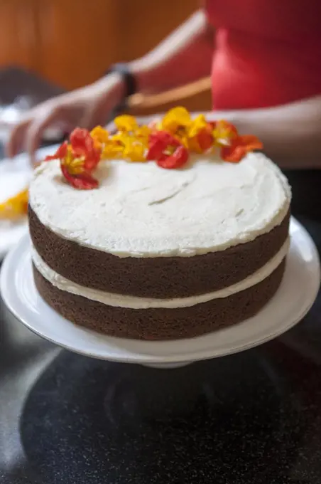 Edible Flowers on Two-Layer Spice Cake with Buttercream Icing