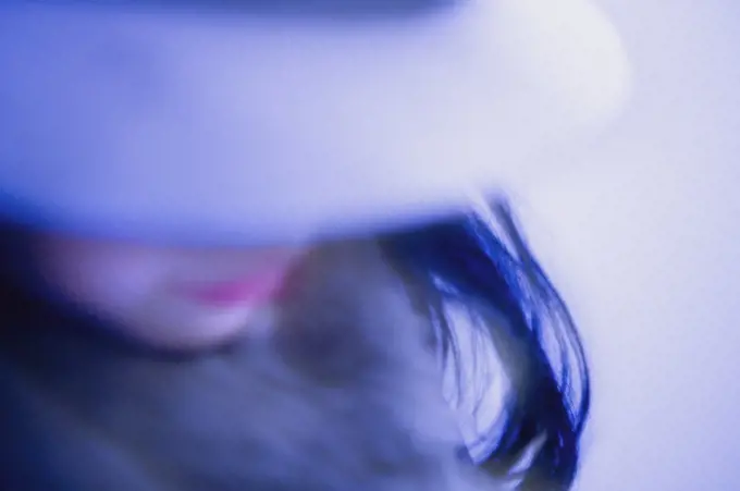 Blurry Blue Girl Wearing Hat