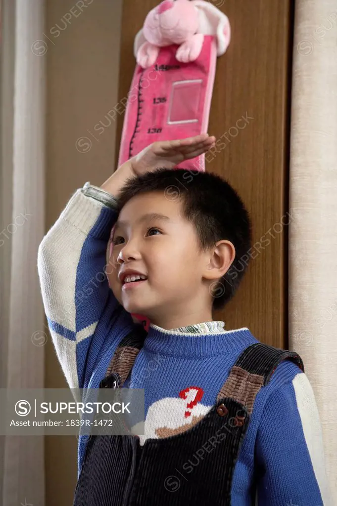 Child Measuring Height